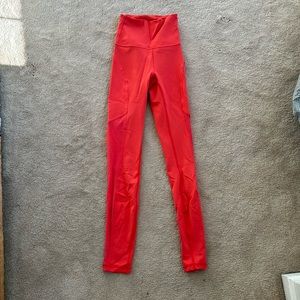 Coral colored Lululemon leggings